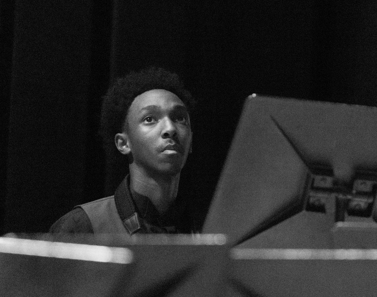 Black-and-white candid portrait of a student